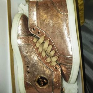 Red Bottom gold sneakers